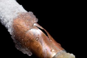 a pipe that has burst from being frozen